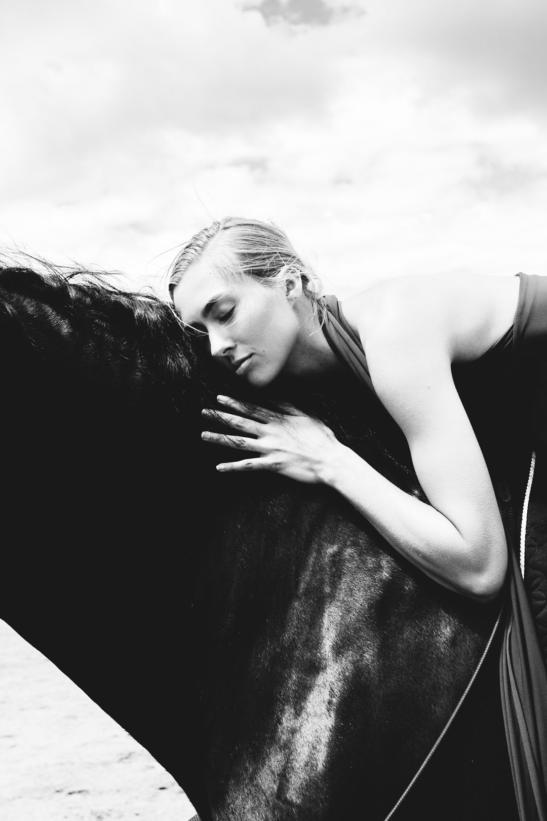 black_and_white_photo_of_woman_and_horse